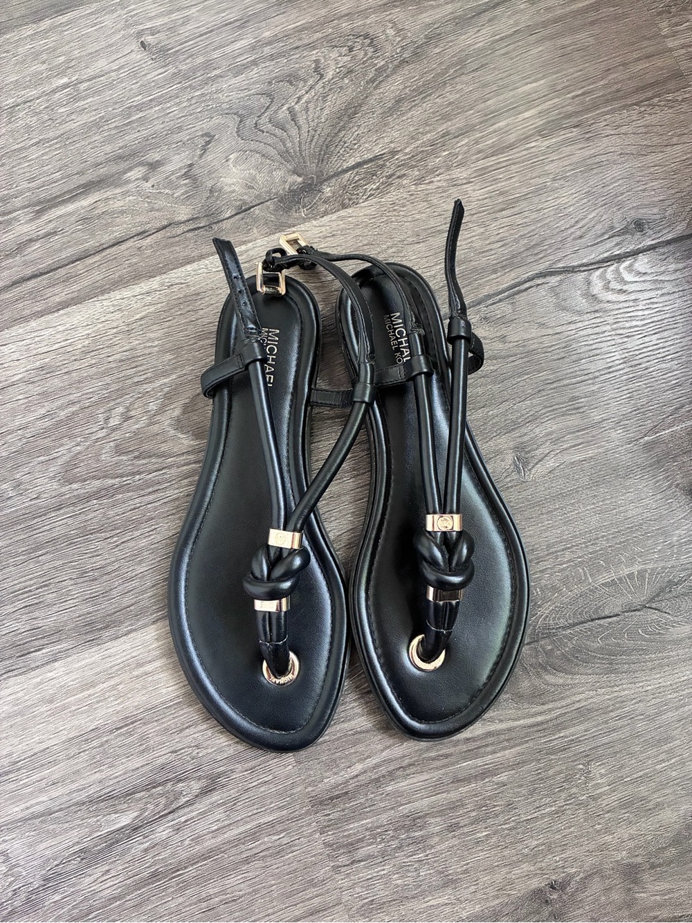 Michael Kors Black Leather Knot Thong Sandals with Gold Accents